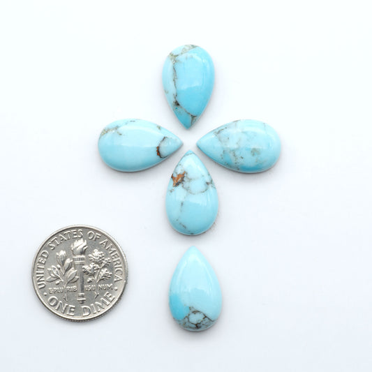 Enhance your jewelry designs with Pressed Turquoise Nugget Cabochons. Crafted from composite materials they add a captivating touch to your creations.