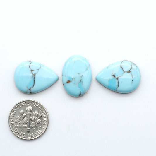 Enhance your jewelry designs with Pressed Turquoise Nugget Cabochons. Crafted from composite materials they add a captivating touch to your creations.