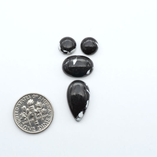 These White Buffalo Cabochons are expertly cut and polished from composite material, resulting in a stunning and long-lasting gemstone.