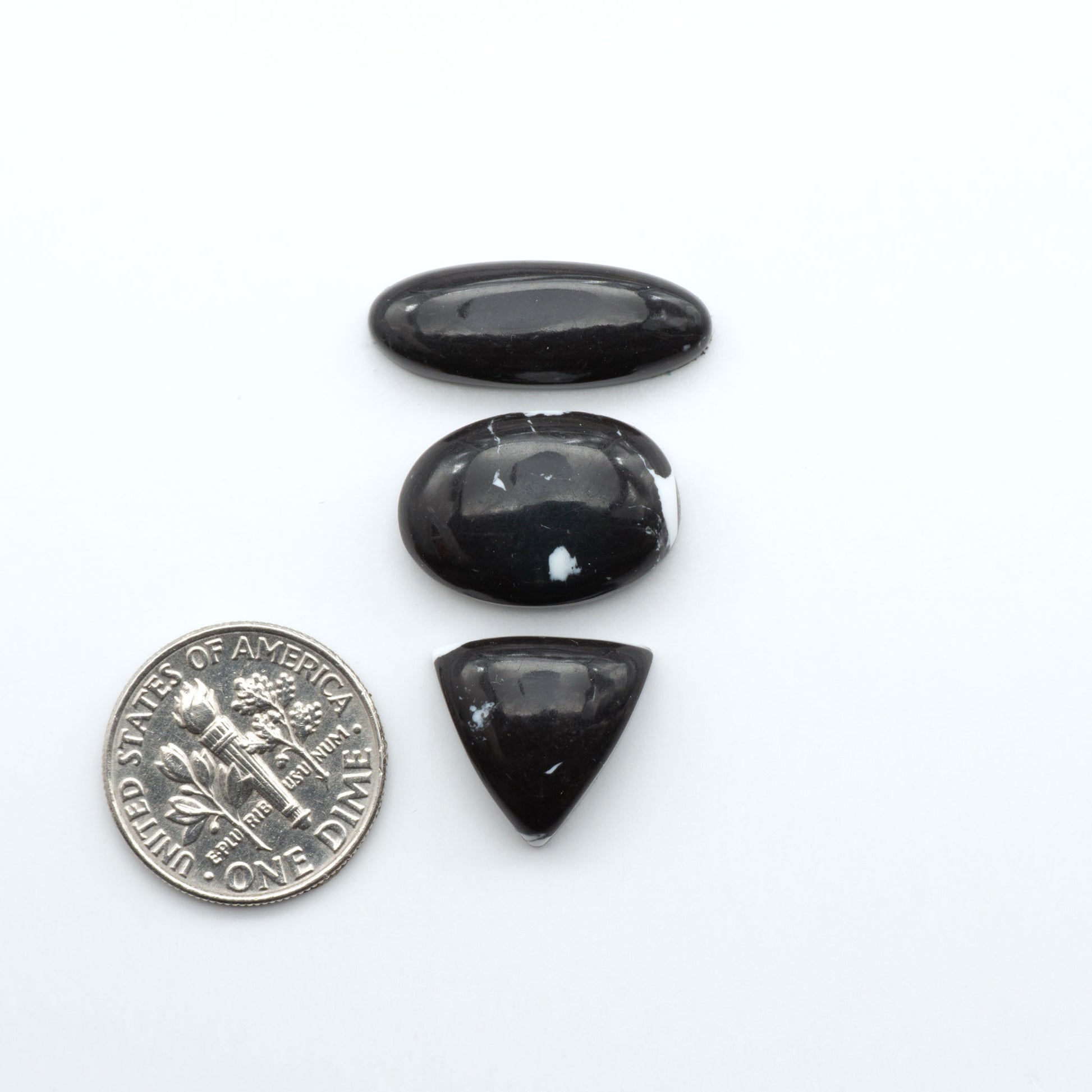 These White Buffalo Cabochons are expertly cut and polished from composite material, resulting in a stunning and long-lasting gemstone.