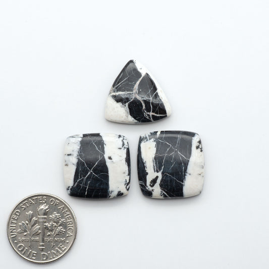 Natural White Buffalo Stone Cabochons are semi-precious gemstones cut into shapes ideal for jewelry-making, making them an excellent choice for artisans.