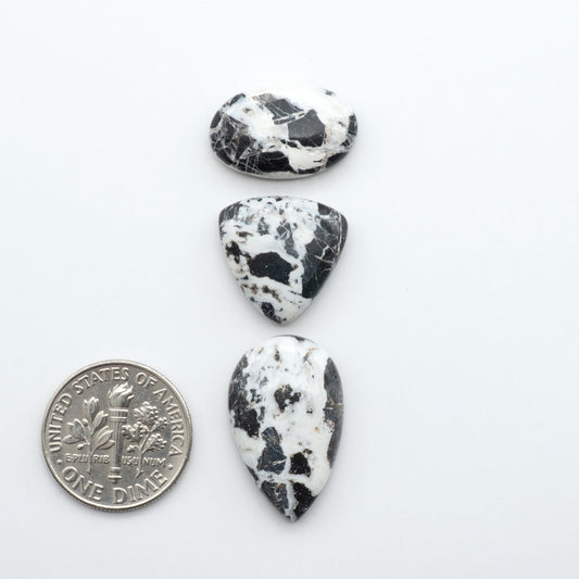 Natural White Buffalo Stone Cabochons are semi-precious gemstones cut into shapes ideal for jewelry-making, making them an excellent choice for artisans.