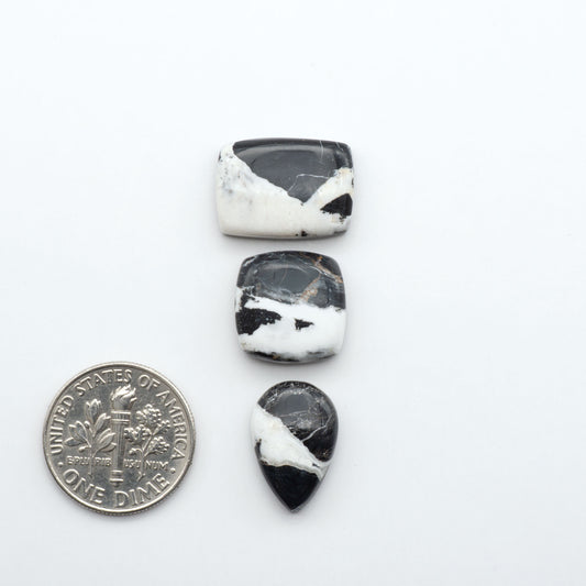 Natural White Buffalo Stone Cabochons are semi-precious gemstones cut into shapes ideal for jewelry-making, making them an excellent choice for artisans.