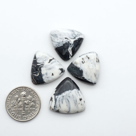 Natural White Buffalo Stone Cabochons are semi-precious gemstones cut into shapes ideal for jewelry-making, making them an excellent choice for artisans.