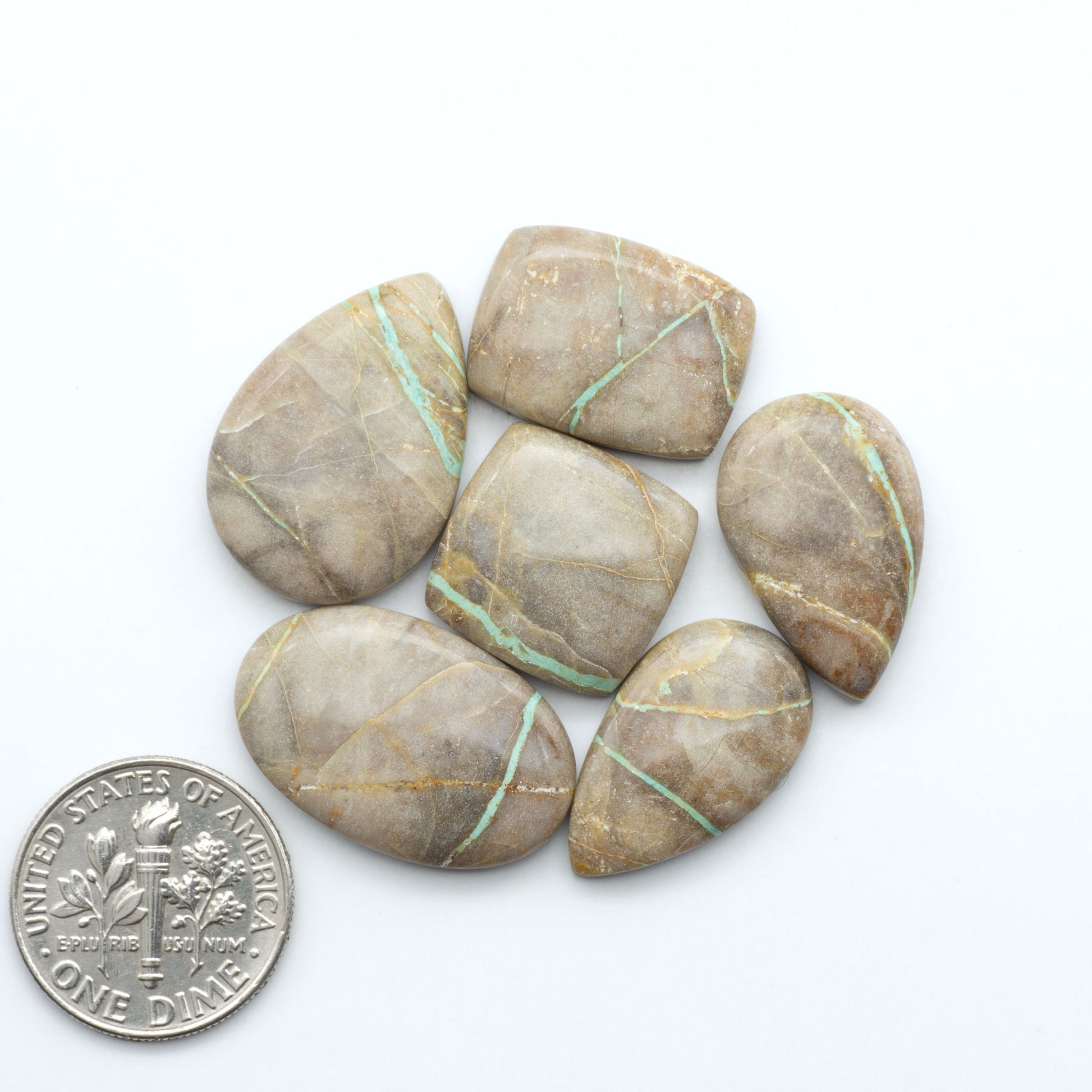 These Crow Springs Ribbon Turquoise Cabochons have a rich color and matrix that are sure to add a unique touch to a variety of jewelry pieces.