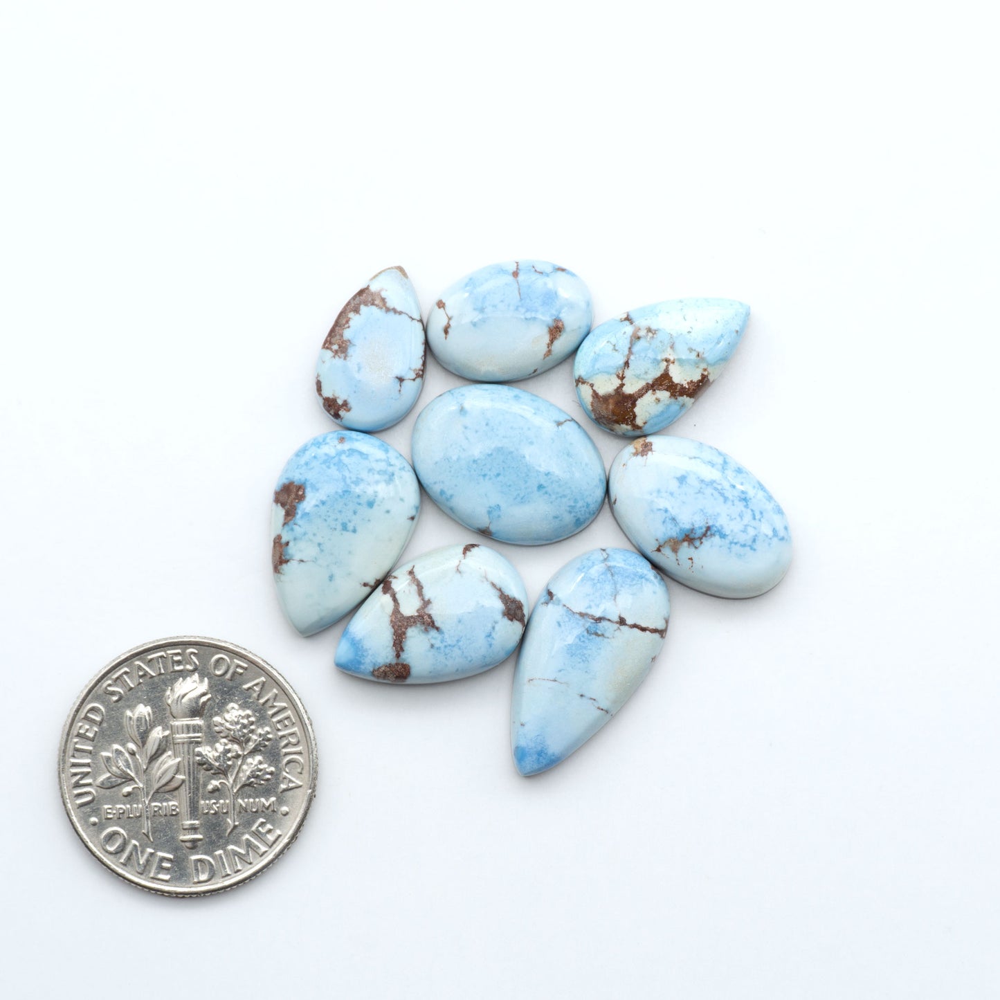 Discover the beauty of Natural Golden Hills Turquoise—prized for its icy blue tones, golden matrix, and exceptional quality. Ideal for artisan jewelry designs.
