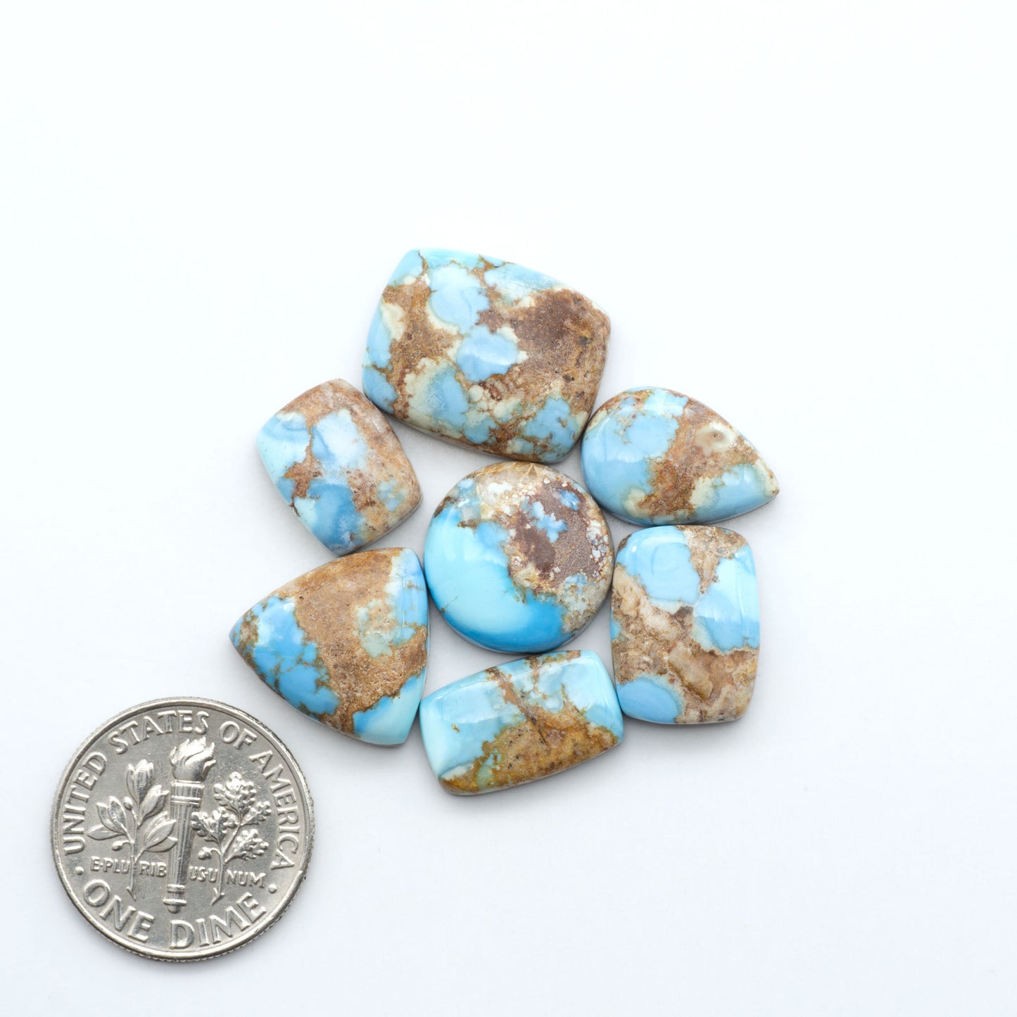 Discover the beauty of Natural Golden Hills Turquoise—prized for its icy blue tones, golden matrix, and exceptional quality. Ideal for artisan jewelry designs.
