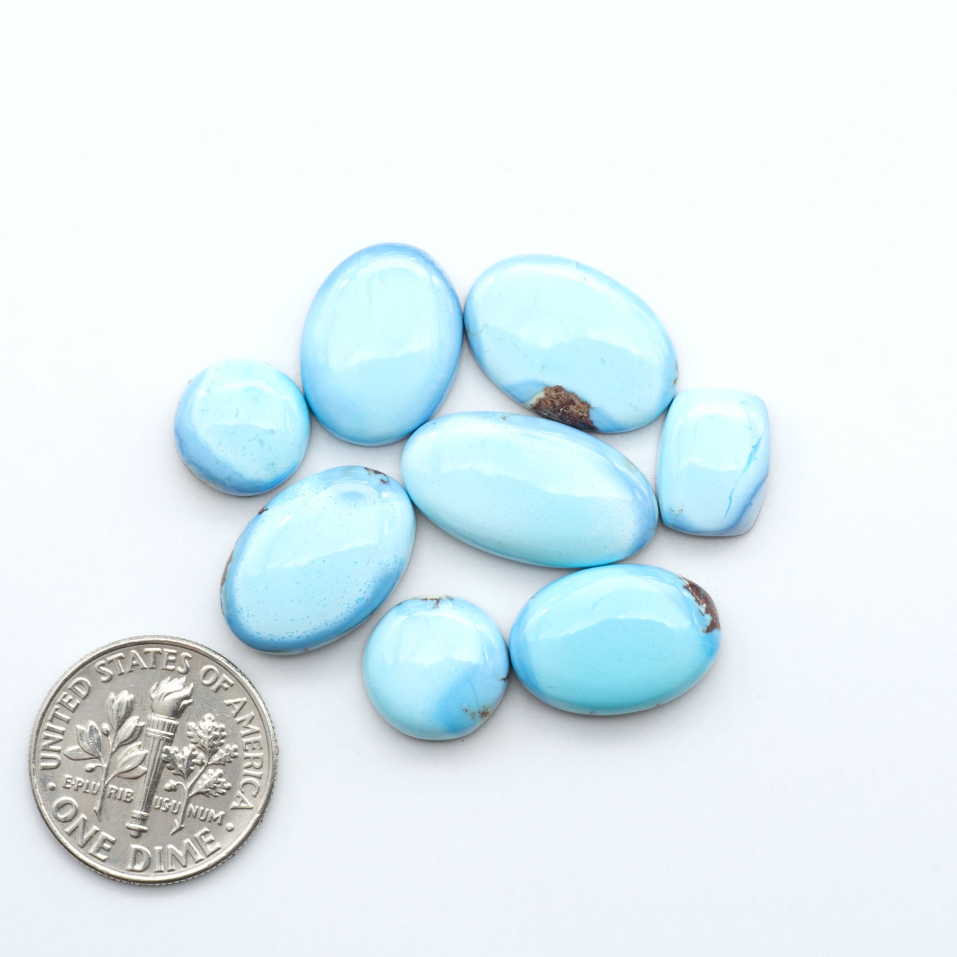 Discover the beauty of Natural Golden Hills Turquoise—prized for its icy blue tones, golden matrix, and exceptional quality. Ideal for artisan jewelry designs.
