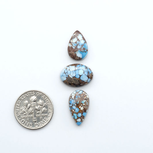Discover the beauty of Natural Golden Hills Turquoise—prized for its icy blue tones, golden matrix, and exceptional quality. Ideal for artisan jewelry designs.
