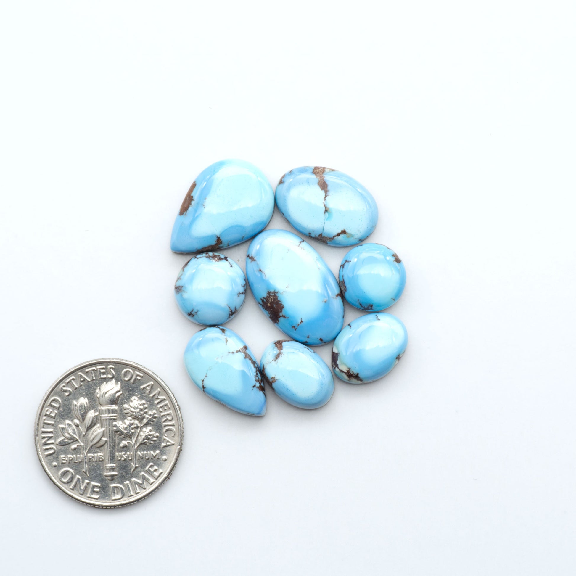 Discover the beauty of Natural Golden Hills Turquoise—prized for its icy blue tones, golden matrix, and exceptional quality. Ideal for artisan jewelry designs.
