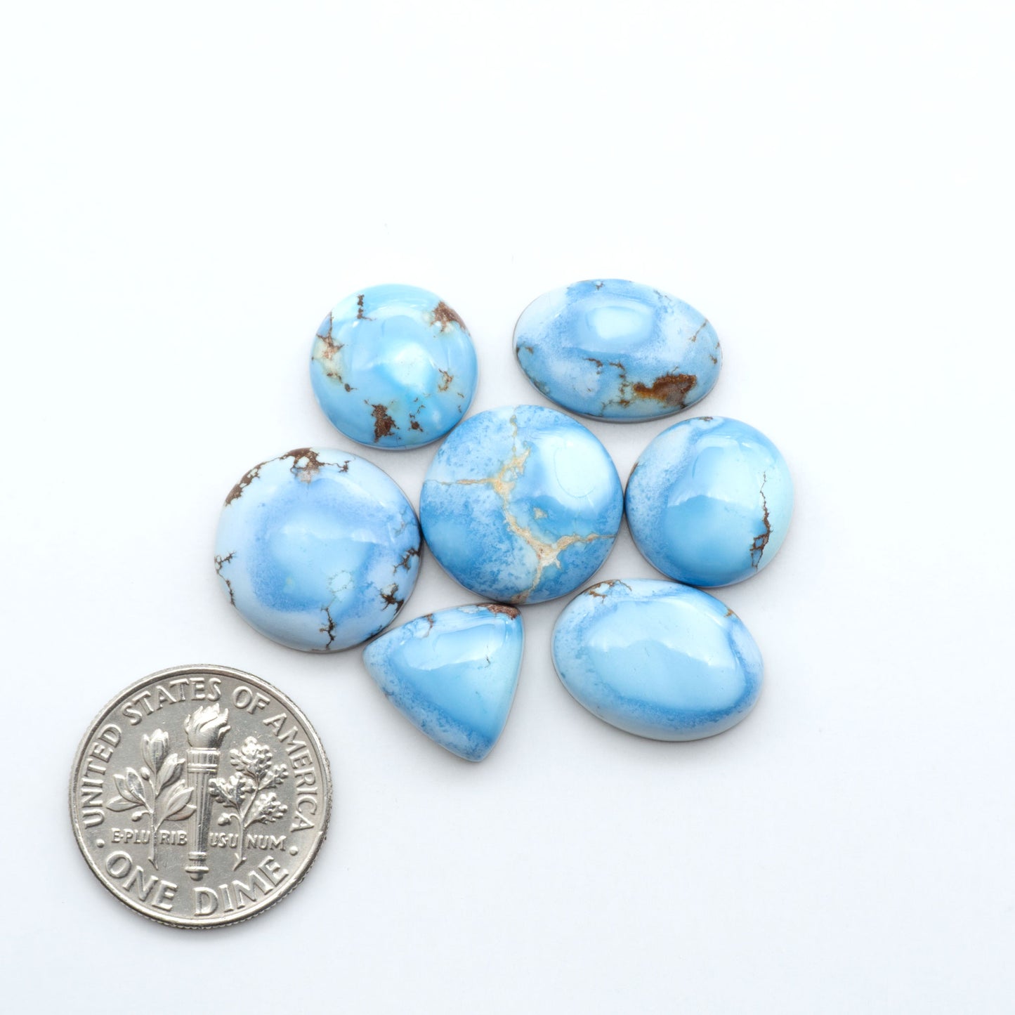 Discover the beauty of Natural Golden Hills Turquoise—prized for its icy blue tones, golden matrix, and exceptional quality. Ideal for artisan jewelry designs.
