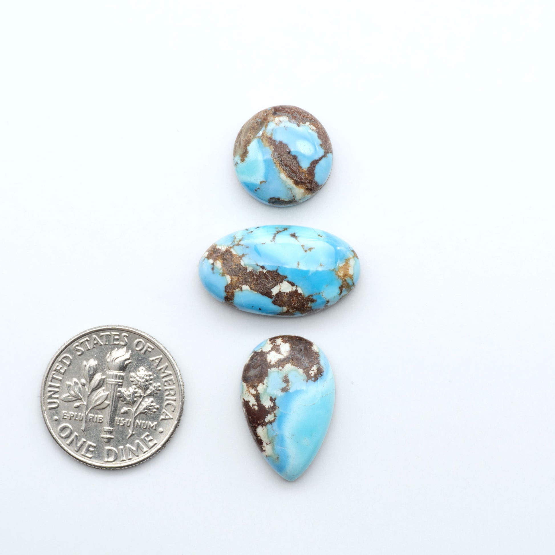 Discover the beauty of Natural Golden Hills Turquoise—prized for its icy blue tones, golden matrix, and exceptional quality. Ideal for artisan jewelry designs.
