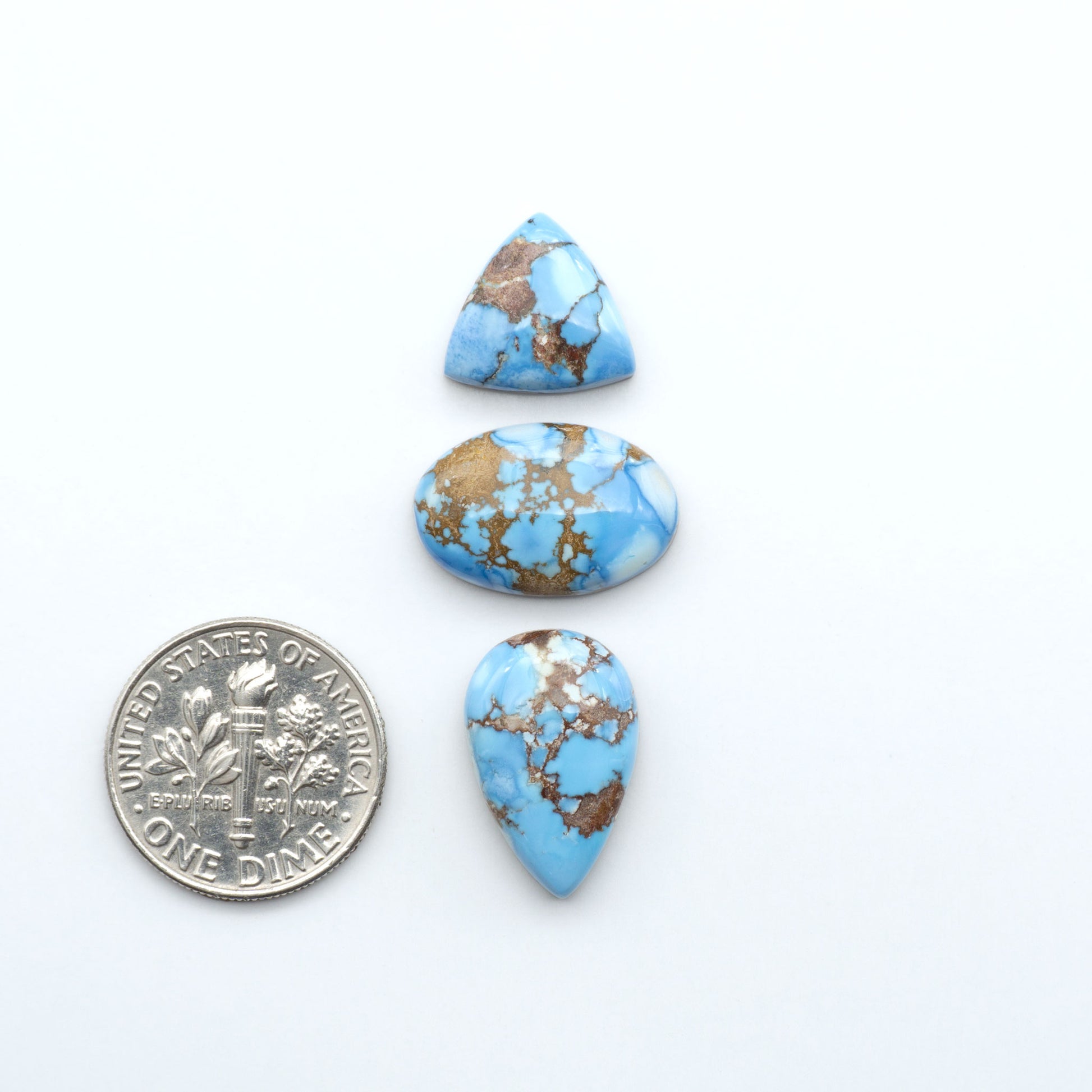 Discover the beauty of Natural Golden Hills Turquoise—prized for its icy blue tones, golden matrix, and exceptional quality. Ideal for artisan jewelry designs.
