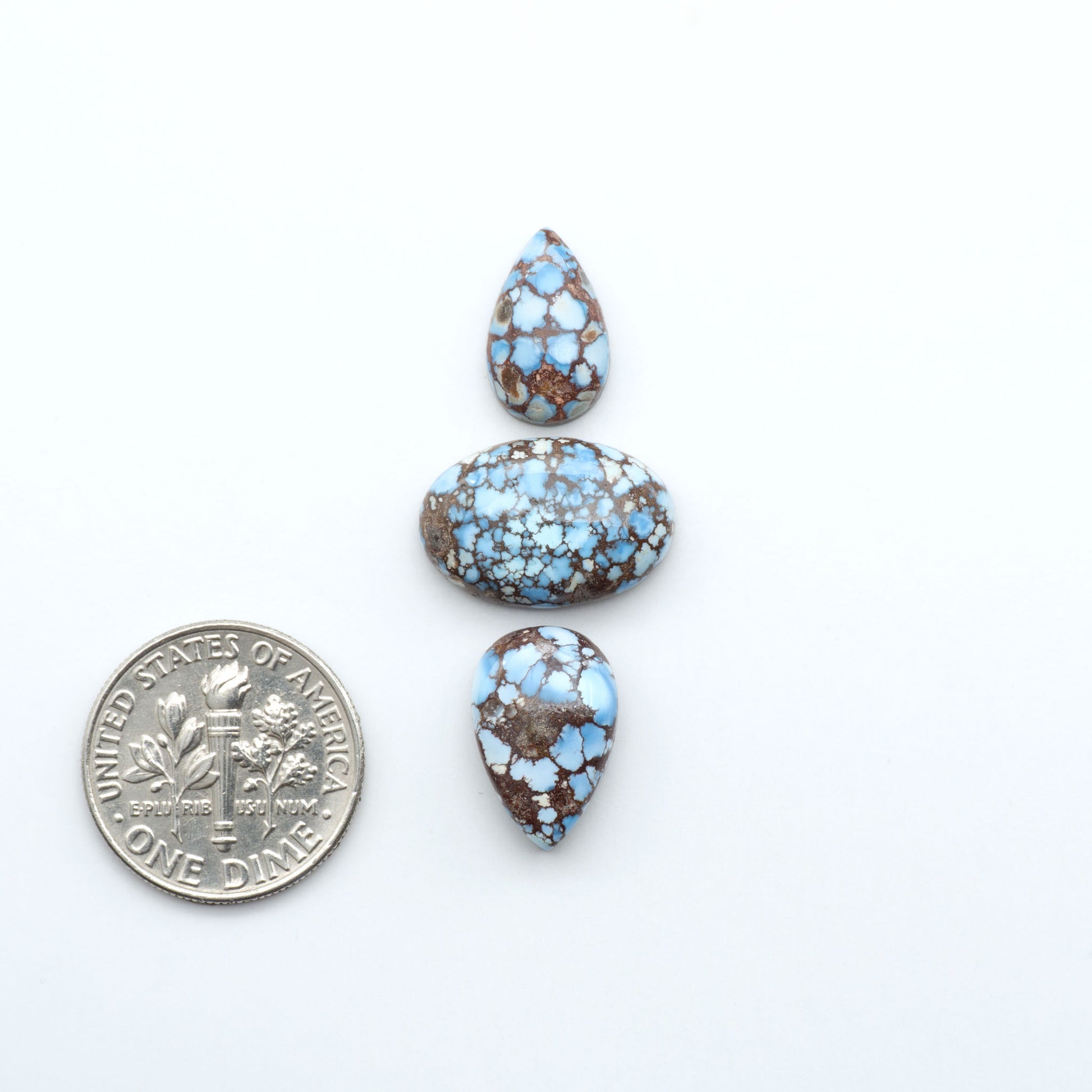 Discover the beauty of Natural Golden Hills Turquoise—prized for its icy blue tones, golden matrix, and exceptional quality. Ideal for artisan jewelry designs.
