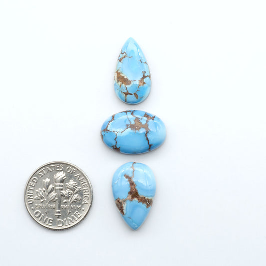 Discover the beauty of Natural Golden Hills Turquoise—prized for its icy blue tones, golden matrix, and exceptional quality. Ideal for artisan jewelry designs.
