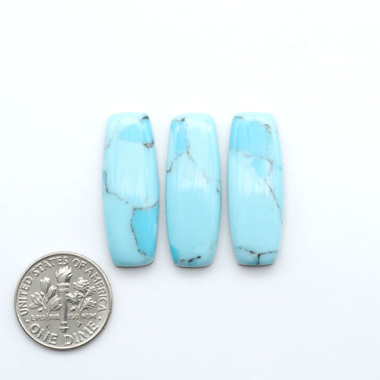 Enhance your jewelry designs with Pressed Turquoise Nugget Cabochons. Crafted from composite materials they add a captivating touch to your creations.
