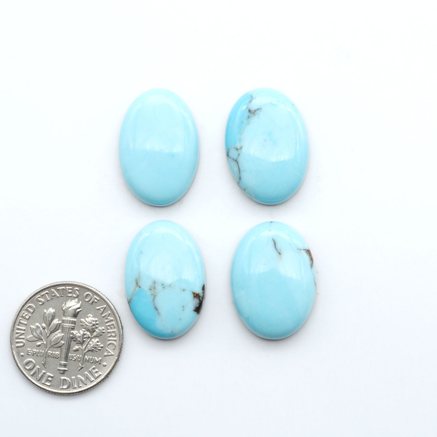 Enhance your jewelry designs with Pressed Turquoise Nugget Cabochons. Crafted from composite materials they add a captivating touch to your creations.