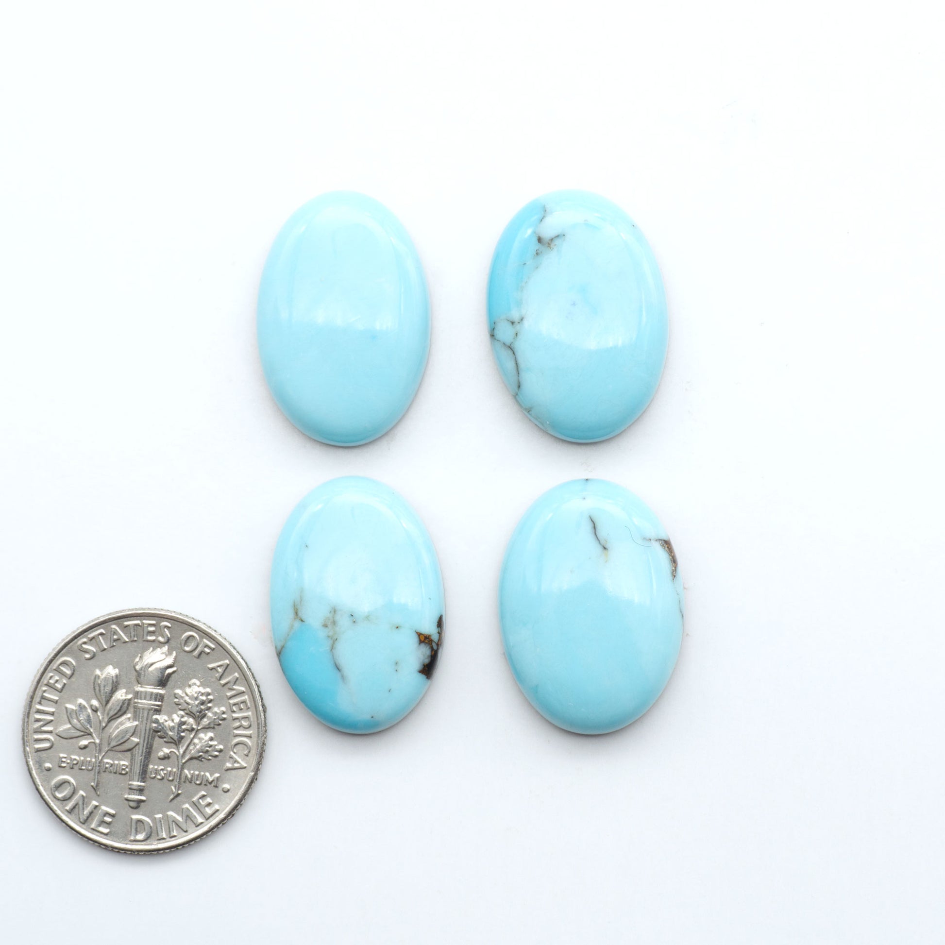 Enhance your jewelry designs with Pressed Turquoise Nugget Cabochons. Crafted from composite materials they add a captivating touch to your creations.