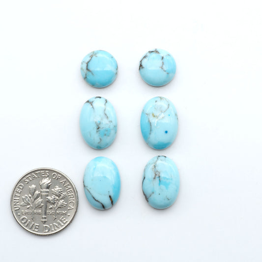 Enhance your jewelry designs with Pressed Turquoise Nugget Cabochons. Crafted from composite materials they add a captivating touch to your creations.