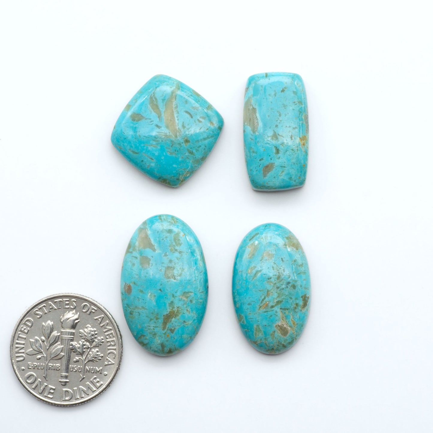 Experience the beauty of Turquoise Mountain Cabochons. With their distinctive blue and green color, these gemstones are perfect for any jewelry piece.