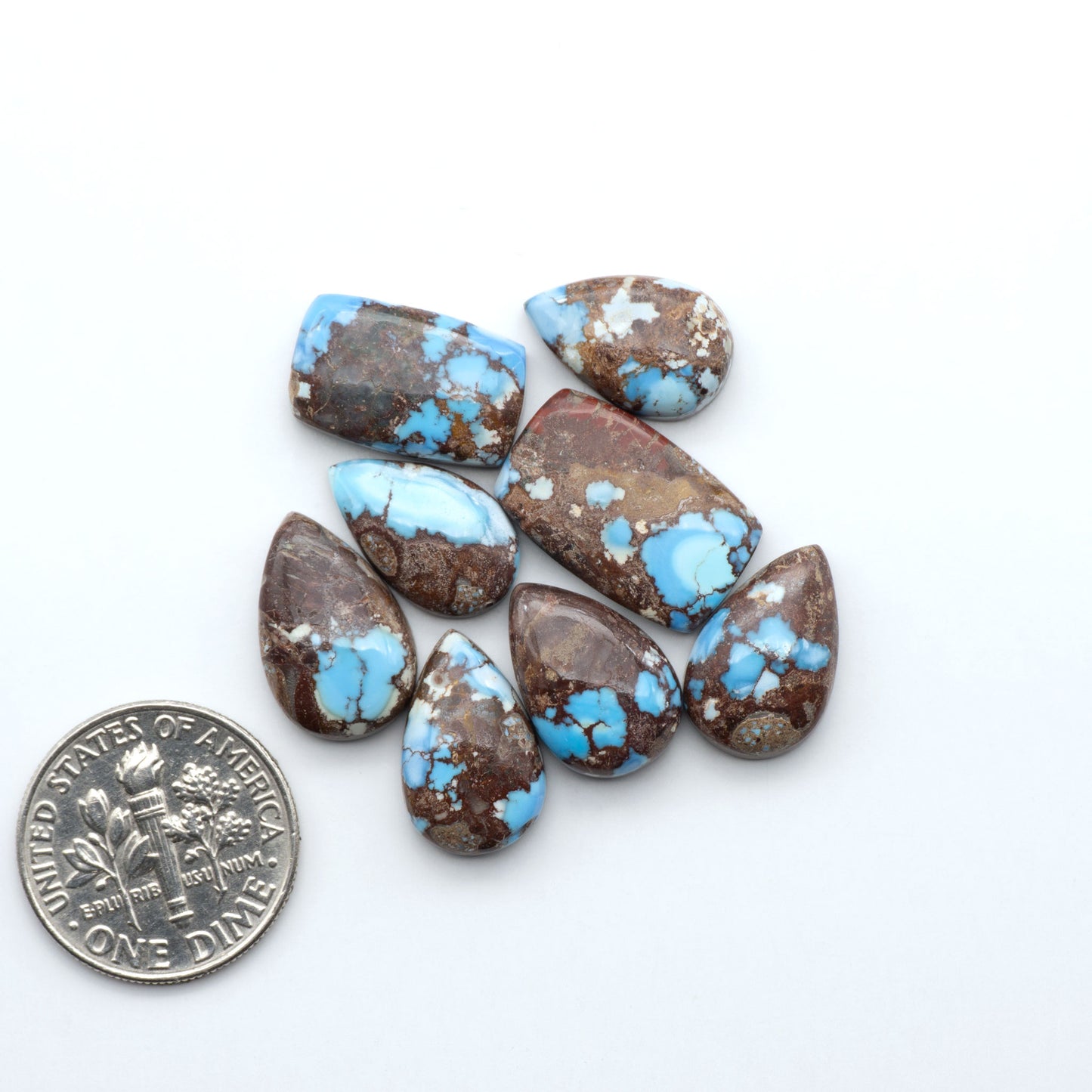 Discover the beauty of Natural Golden Hills Turquoise—prized for its icy blue tones, golden matrix, and exceptional quality. Ideal for artisan jewelry designs.