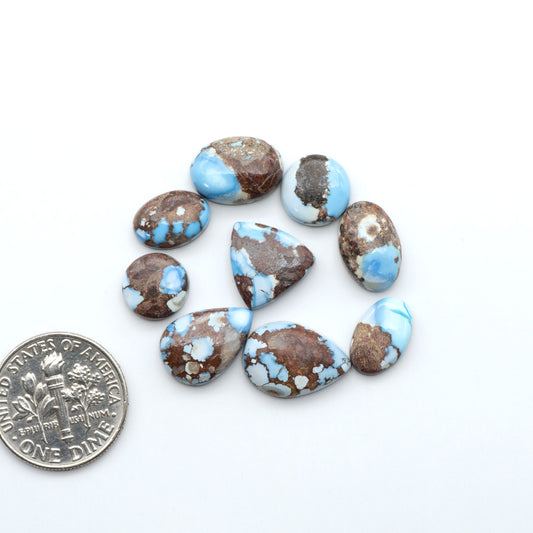 Discover the beauty of Natural Golden Hills Turquoise—prized for its icy blue tones, golden matrix, and exceptional quality. Ideal for artisan jewelry designs.