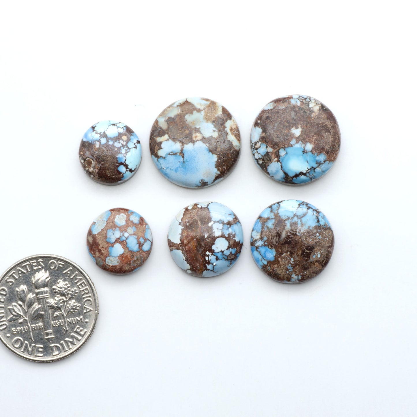 Discover the beauty of Natural Golden Hills Turquoise—prized for its icy blue tones, golden matrix, and exceptional quality. Ideal for artisan jewelry designs.