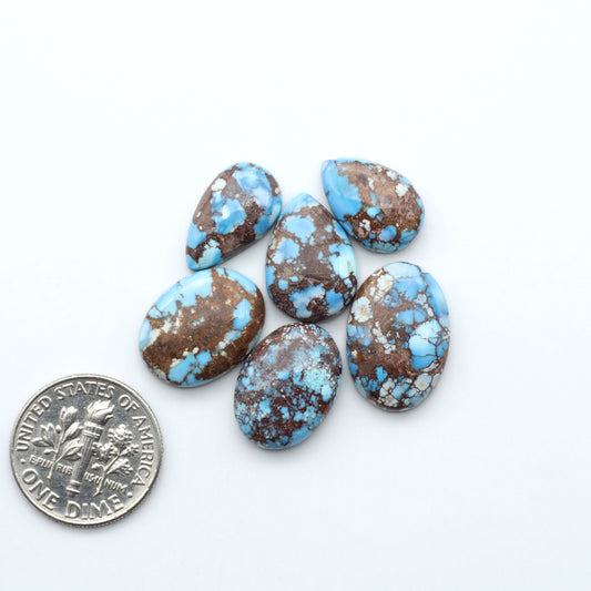Discover the beauty of Natural Golden Hills Turquoise—prized for its icy blue tones, golden matrix, and exceptional quality. Ideal for artisan jewelry designs.