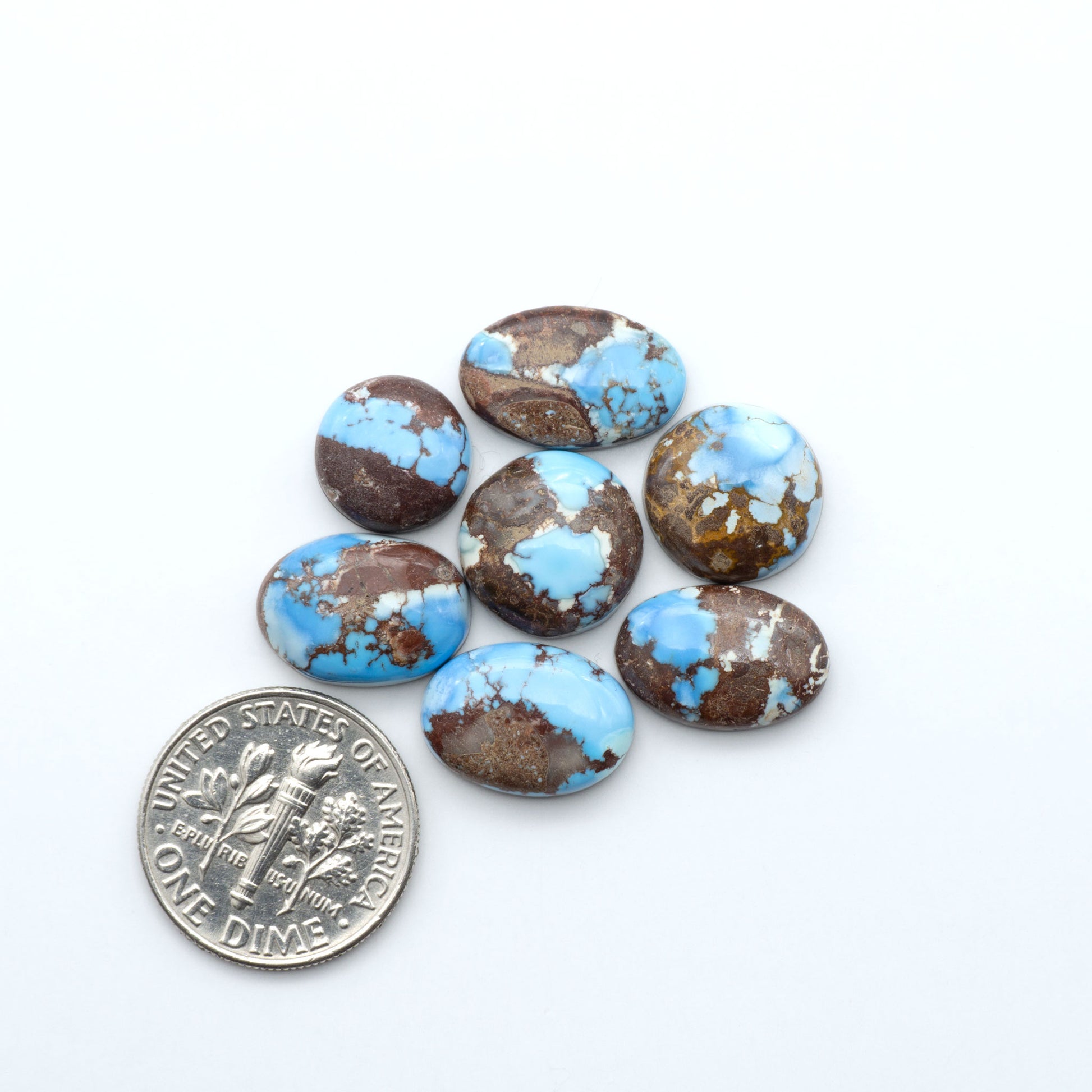 Discover the beauty of Natural Golden Hills Turquoise—prized for its icy blue tones, golden matrix, and exceptional quality. Ideal for artisan jewelry designs.
