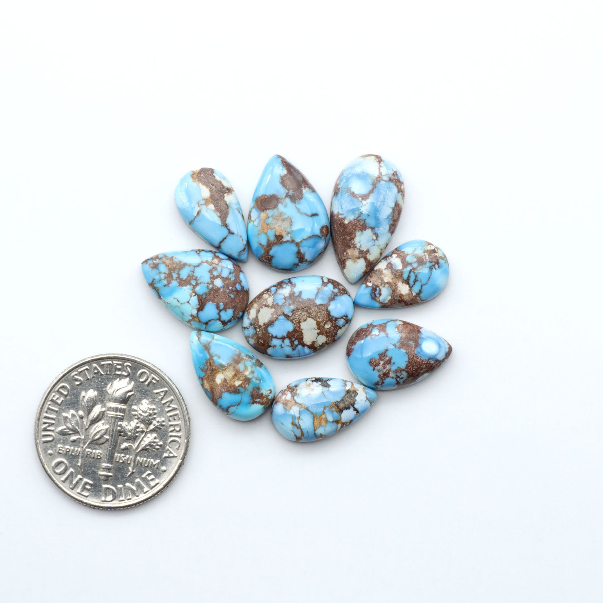 Discover the beauty of Natural Golden Hills Turquoise—prized for its icy blue tones, golden matrix, and exceptional quality. Ideal for artisan jewelry designs.