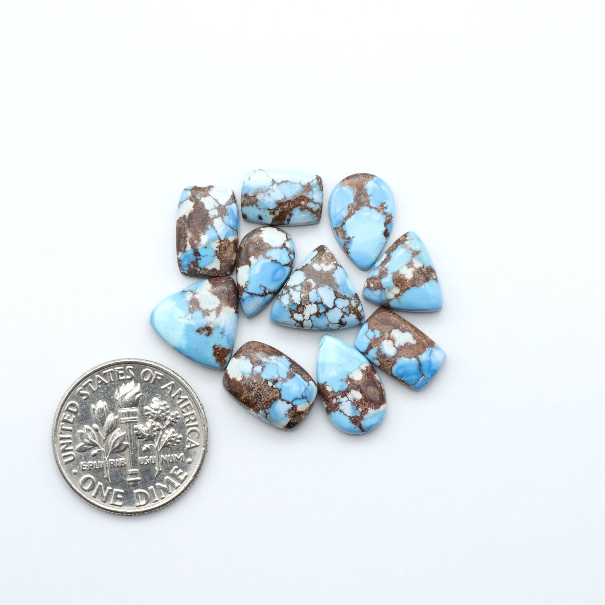 Discover the beauty of Natural Golden Hills Turquoise—prized for its icy blue tones, golden matrix, and exceptional quality. Ideal for artisan jewelry designs.