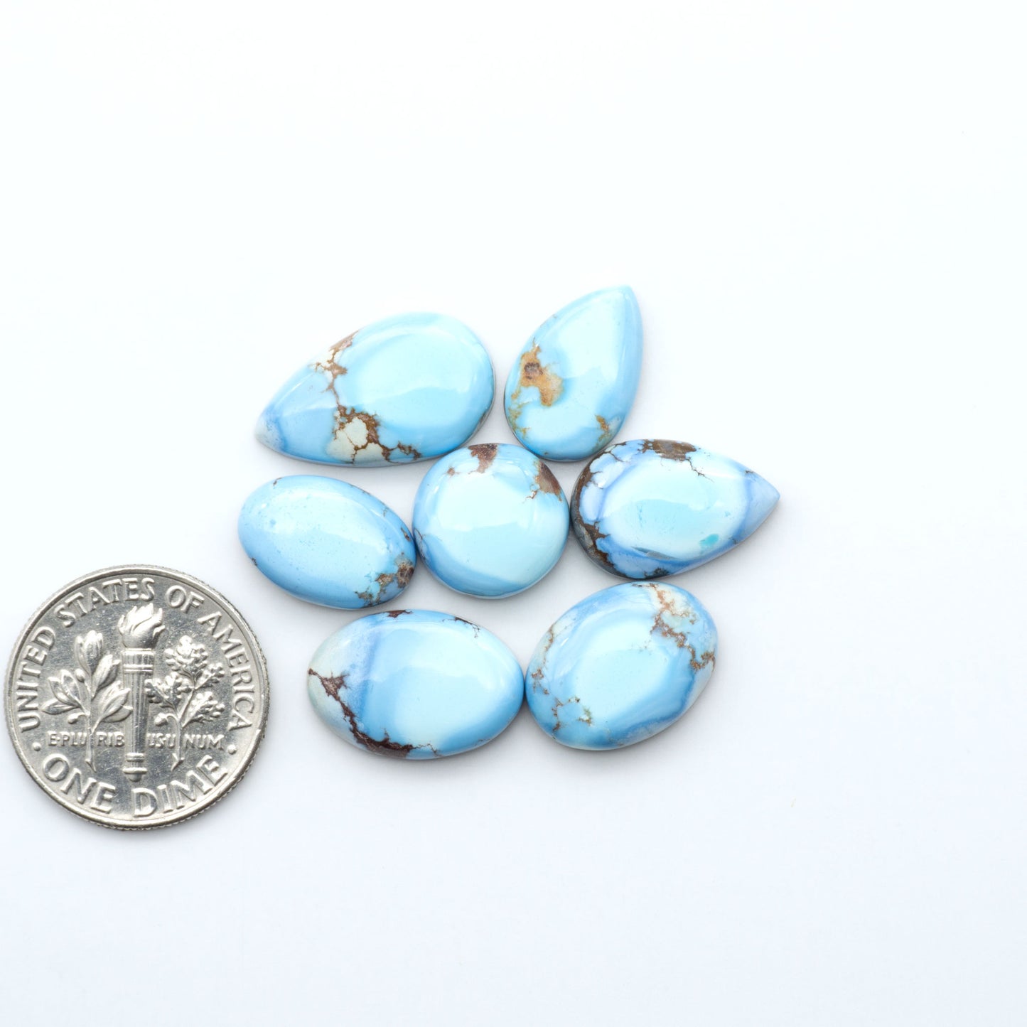 Discover the beauty of Natural Golden Hills Turquoise—prized for its icy blue tones, golden matrix, and exceptional quality. Ideal for artisan jewelry designs.