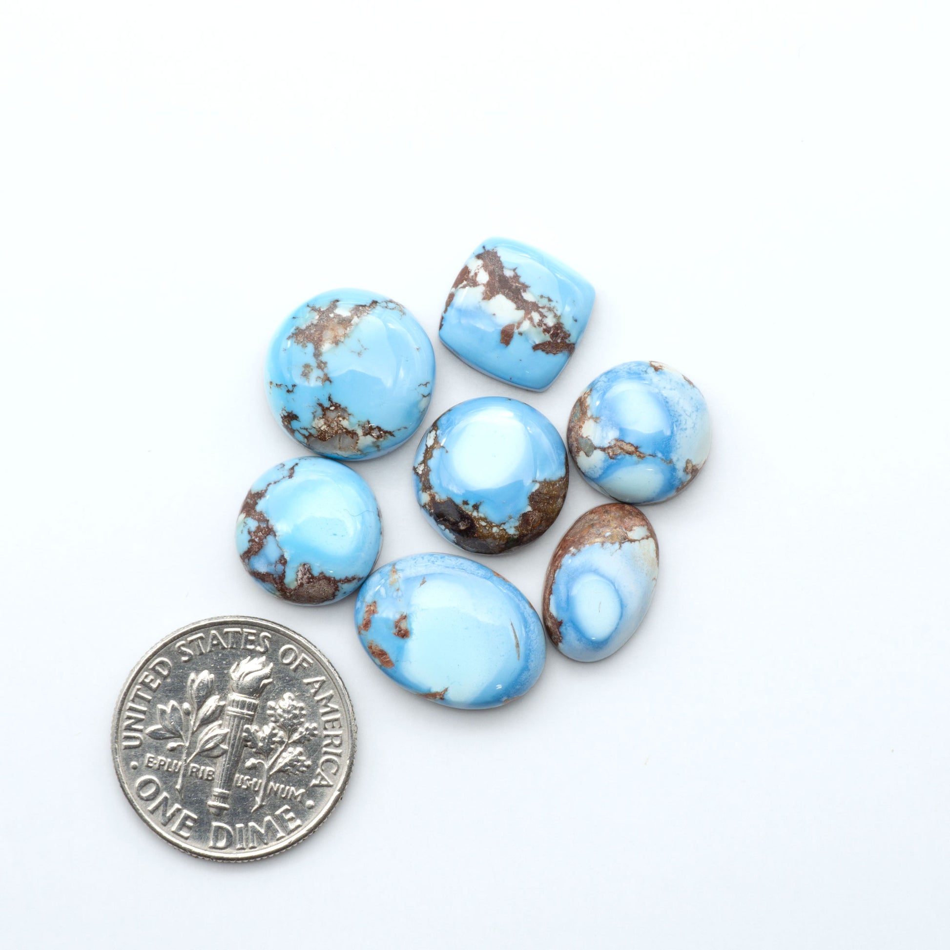 Discover the beauty of Natural Golden Hills Turquoise—prized for its icy blue tones, golden matrix, and exceptional quality. Ideal for artisan jewelry designs.
