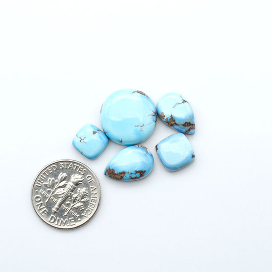 Discover the beauty of Natural Golden Hills Turquoise—prized for its icy blue tones, golden matrix, and exceptional quality. Ideal for artisan jewelry designs.