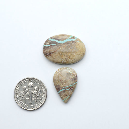 These Crow Springs Ribbon Turquoise Cabochons have a rich color and matrix that are sure to add a unique touch to a variety of jewelry pieces.