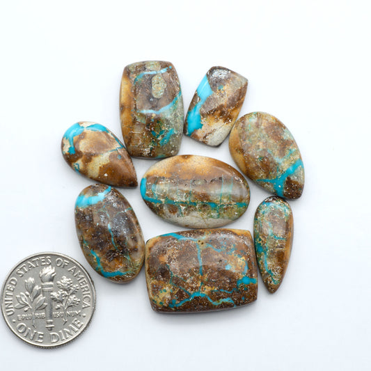 Royston Turquoise cabochons are famous for their distinctive matrix and unique green and blue hues, making them a favored option among jewelry designers.