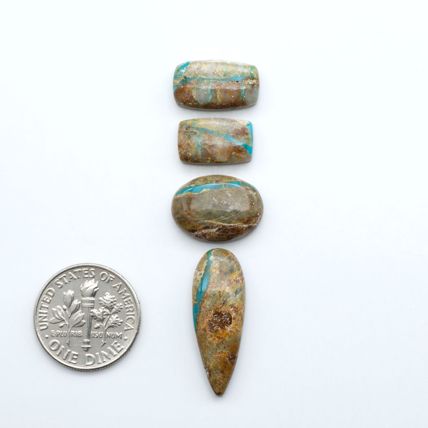 Royston Turquoise cabochons are famous for their distinctive matrix and unique green and blue hues, making them a favored option among jewelry designers.