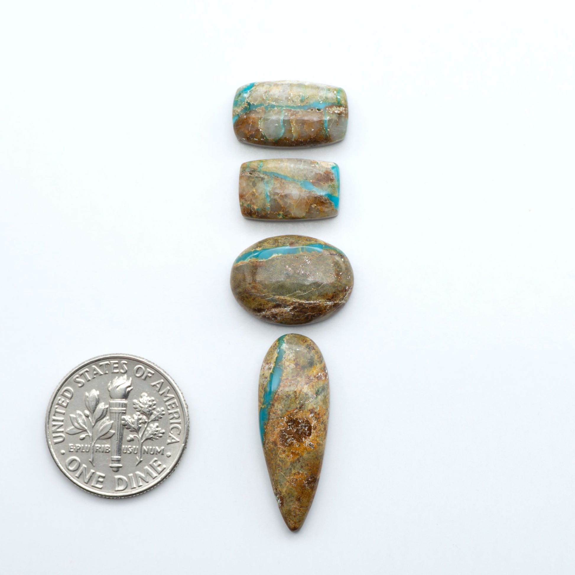 Royston Turquoise cabochons are famous for their distinctive matrix and unique green and blue hues, making them a favored option among jewelry designers.