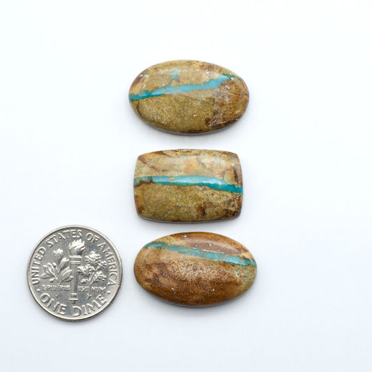 Royston Turquoise cabochons are famous for their distinctive matrix and unique green and blue hues, making them a favored option among jewelry designers.