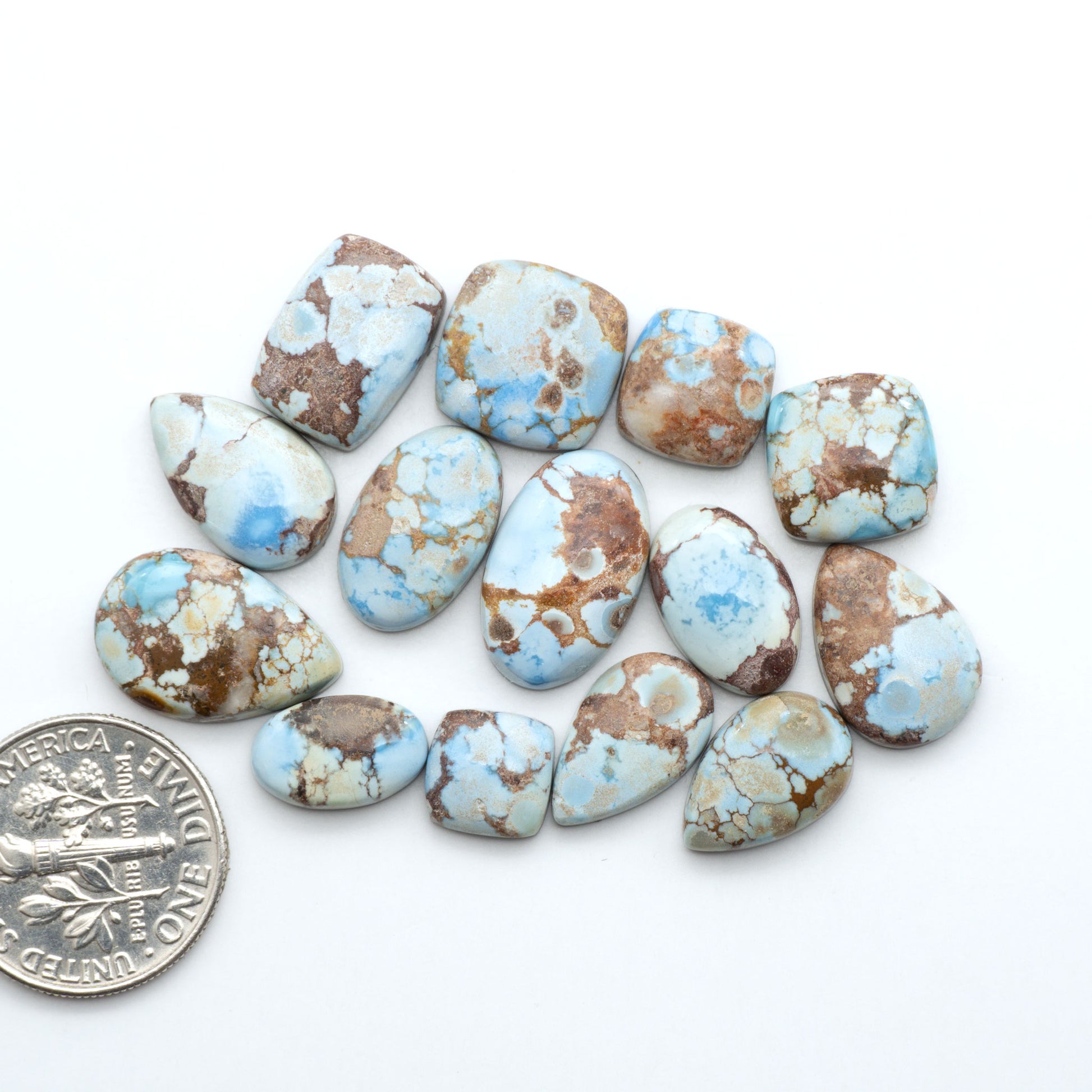 Discover the beauty of Natural Golden Hills Turquoise—prized for its icy blue tones, golden matrix, and exceptional quality. Ideal for artisan jewelry designs.