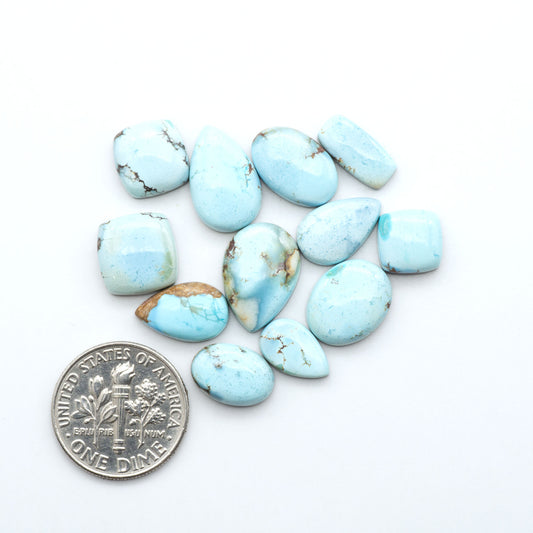 Discover the beauty of Natural Golden Hills Turquoise—prized for its icy blue tones, golden matrix, and exceptional quality. Ideal for artisan jewelry designs.