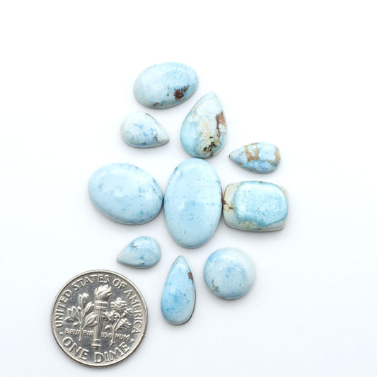 Discover the beauty of Natural Golden Hills Turquoise—prized for its icy blue tones, golden matrix, and exceptional quality. Ideal for artisan jewelry designs.