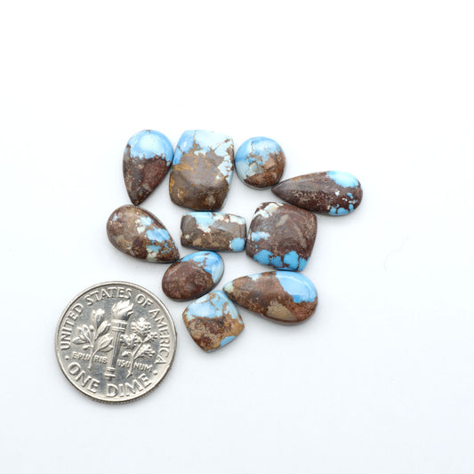 Discover the beauty of Natural Golden Hills Turquoise—prized for its icy blue tones, golden matrix, and exceptional quality. Ideal for artisan jewelry designs.
