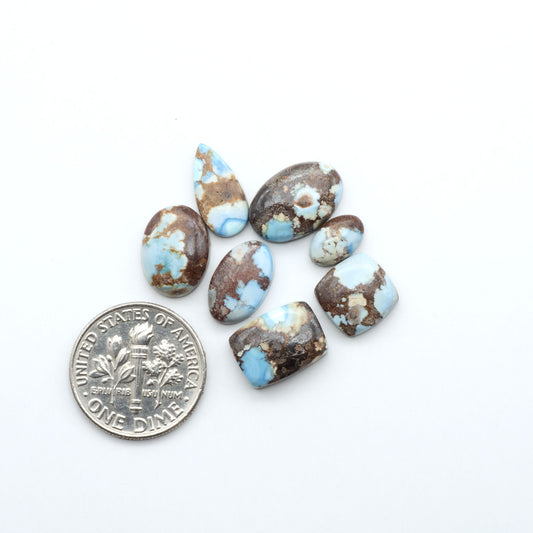 Discover the beauty of Natural Golden Hills Turquoise—prized for its icy blue tones, golden matrix, and exceptional quality. Ideal for artisan jewelry designs.