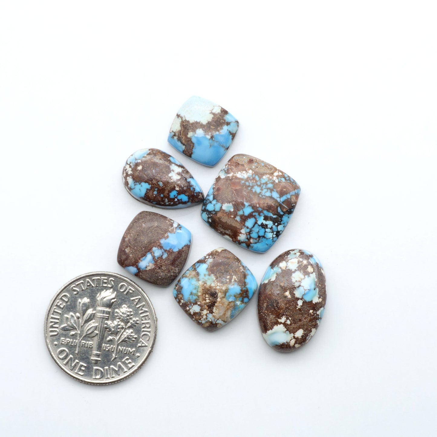 Discover the beauty of Natural Golden Hills Turquoise—prized for its icy blue tones, golden matrix, and exceptional quality. Ideal for artisan jewelry designs.