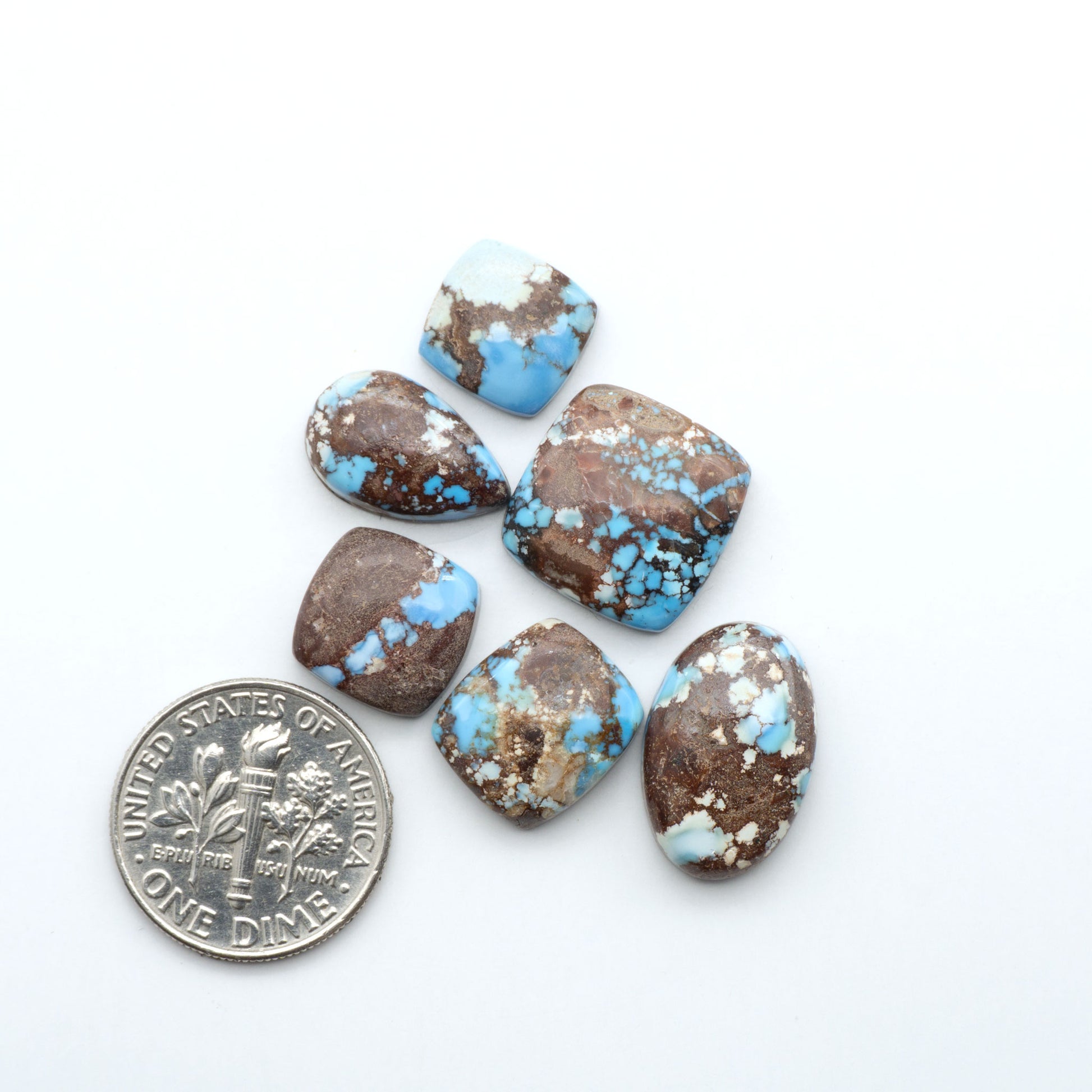 Discover the beauty of Natural Golden Hills Turquoise—prized for its icy blue tones, golden matrix, and exceptional quality. Ideal for artisan jewelry designs.