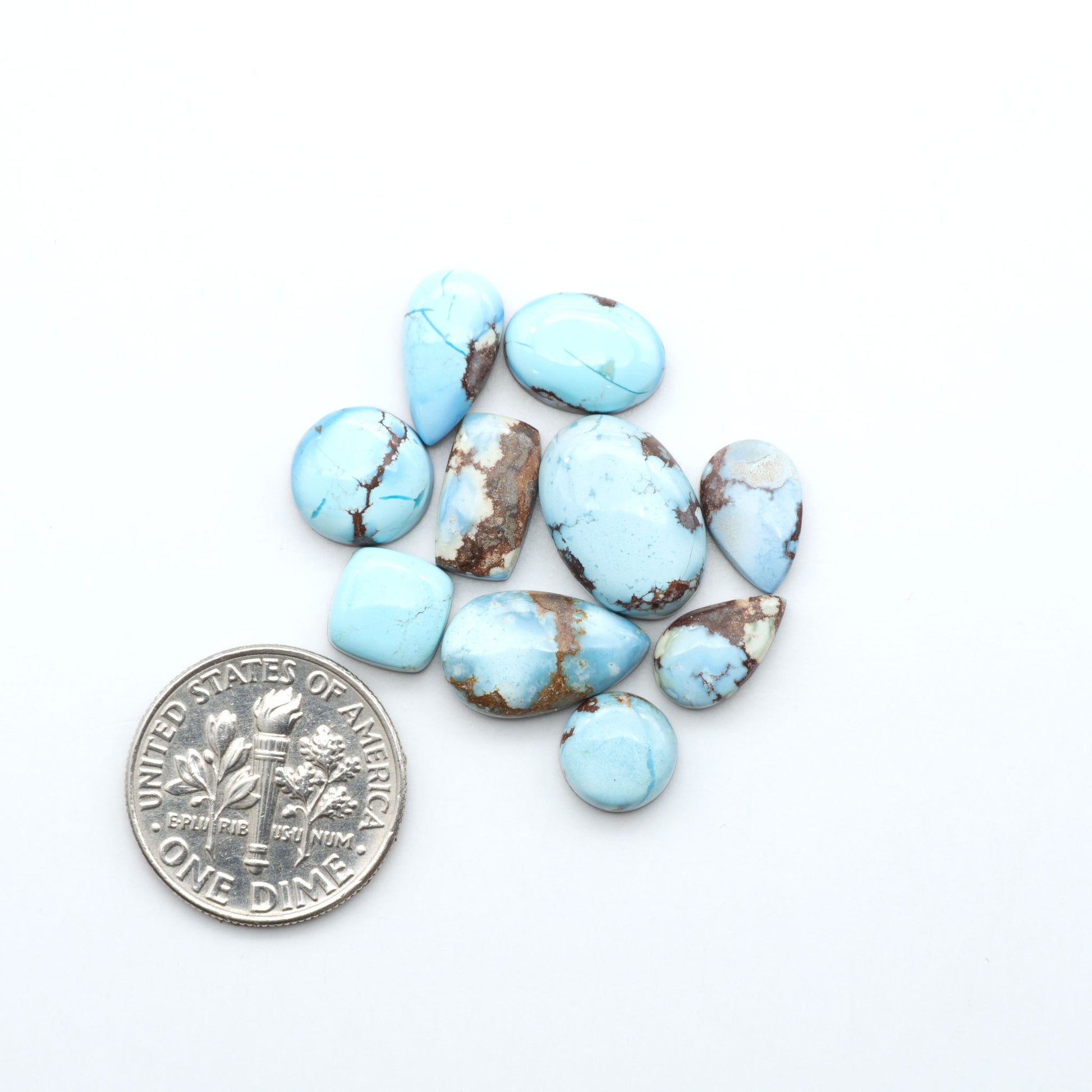 Discover the beauty of Natural Golden Hills Turquoise—prized for its icy blue tones, golden matrix, and exceptional quality. Ideal for artisan jewelry designs.