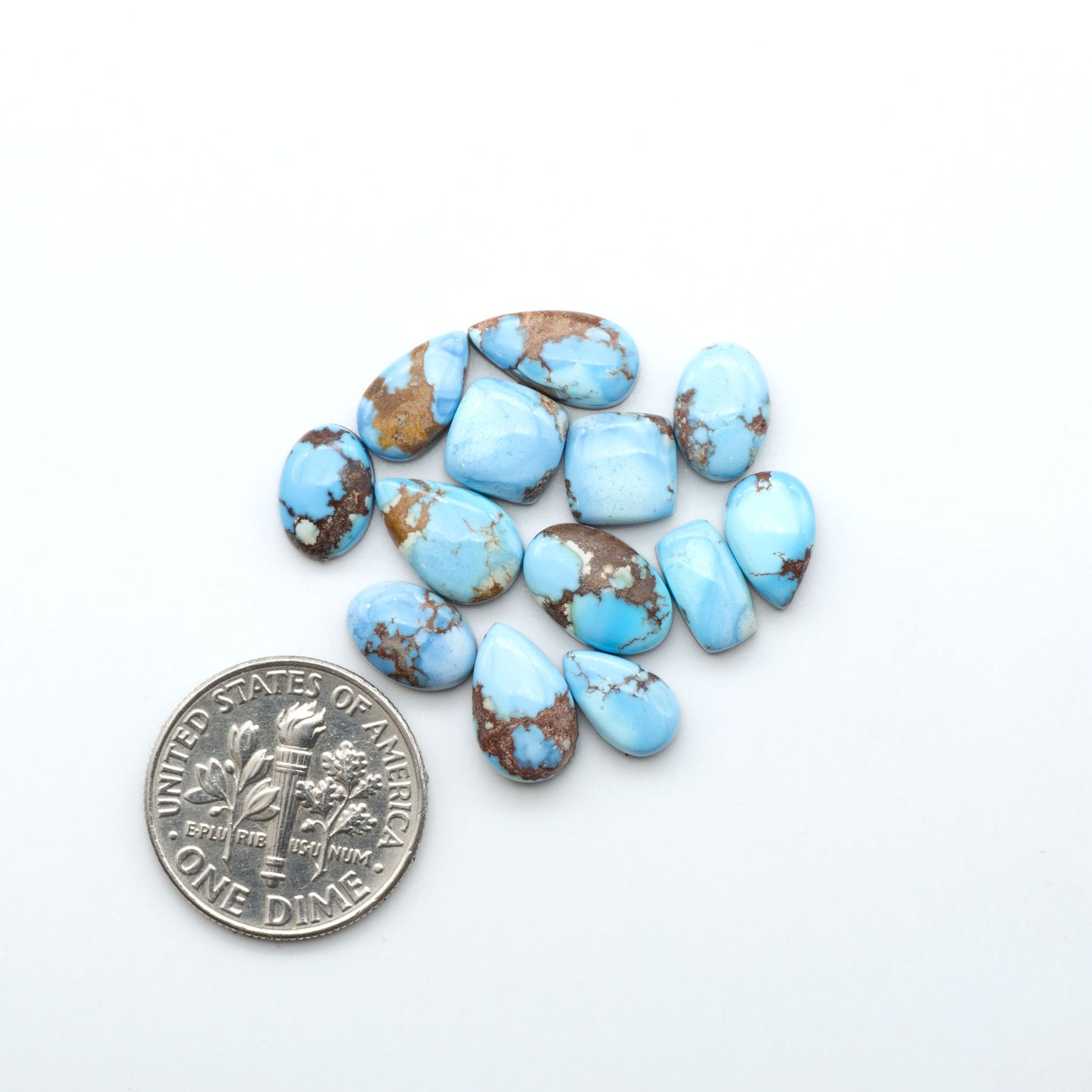 Discover the beauty of Natural Golden Hills Turquoise—prized for its icy blue tones, golden matrix, and exceptional quality. Ideal for artisan jewelry designs.