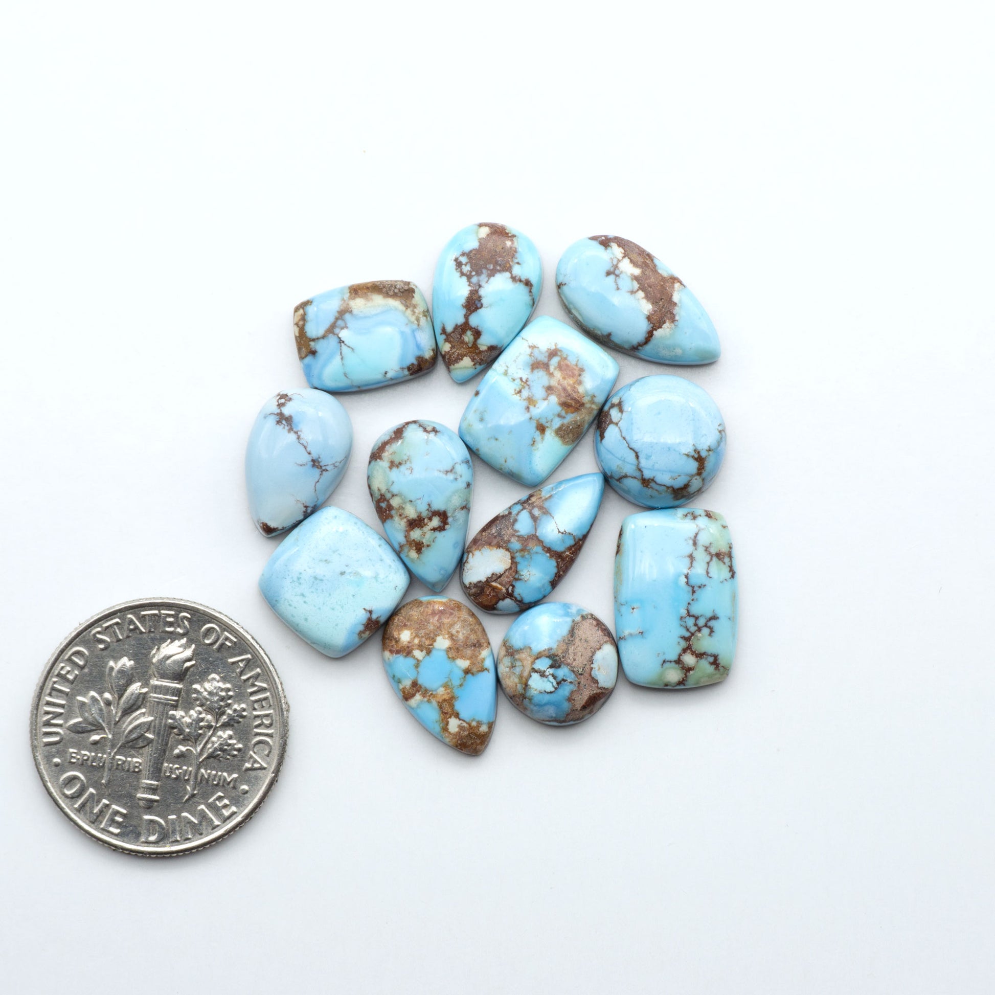 Discover the beauty of Natural Golden Hills Turquoise—prized for its icy blue tones, golden matrix, and exceptional quality. Ideal for artisan jewelry designs.