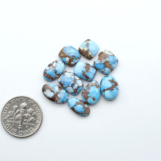 Discover the beauty of Natural Golden Hills Turquoise—prized for its icy blue tones, golden matrix, and exceptional quality. Ideal for artisan jewelry designs.